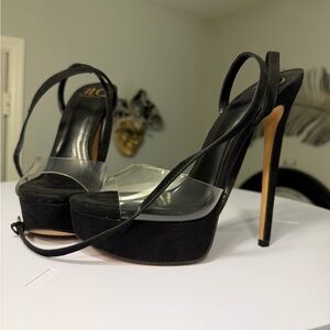 Jennifer Lopez Black and Clear Platform Heels